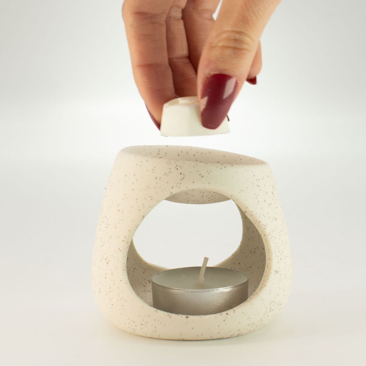 Keramik-Duftlampe im Zen-Stil – Runde Kieselform – Gesprenkeltes Cremeweiß