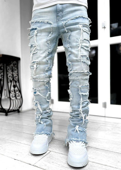 Modische Herren-Jeans mit Fransen und Rissen, individuell gepatcht, schmal geschnittene Stacked Jeans