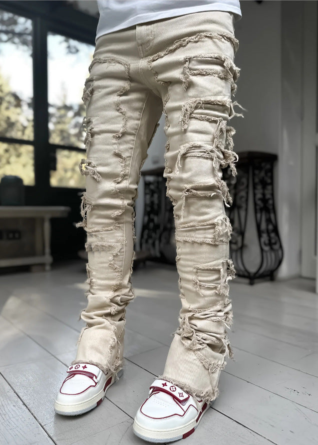 Modische Herren-Jeans mit Fransen und Rissen, individuell gepatcht, schmal geschnittene Stacked Jeans