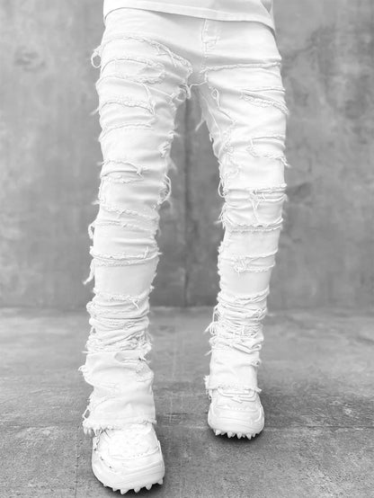 Modische Herren-Jeans mit Fransen und Rissen, individuell gepatcht, schmal geschnittene Stacked Jeans